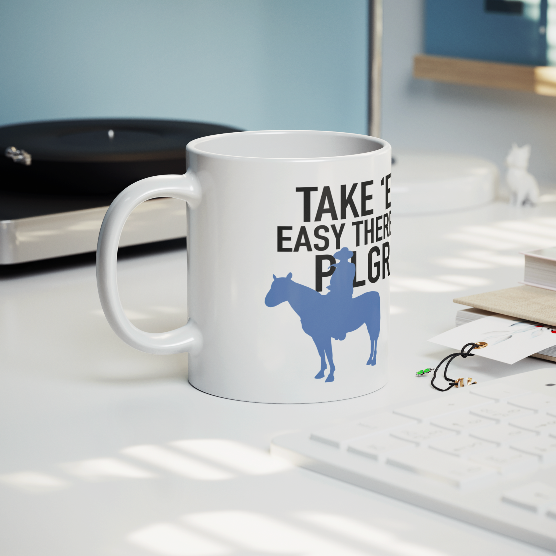John_Wayne_Inspired_Mug_TAKE_ER_EASY_T_Lifestyle_Record_Player_Mockup.png_15541918
